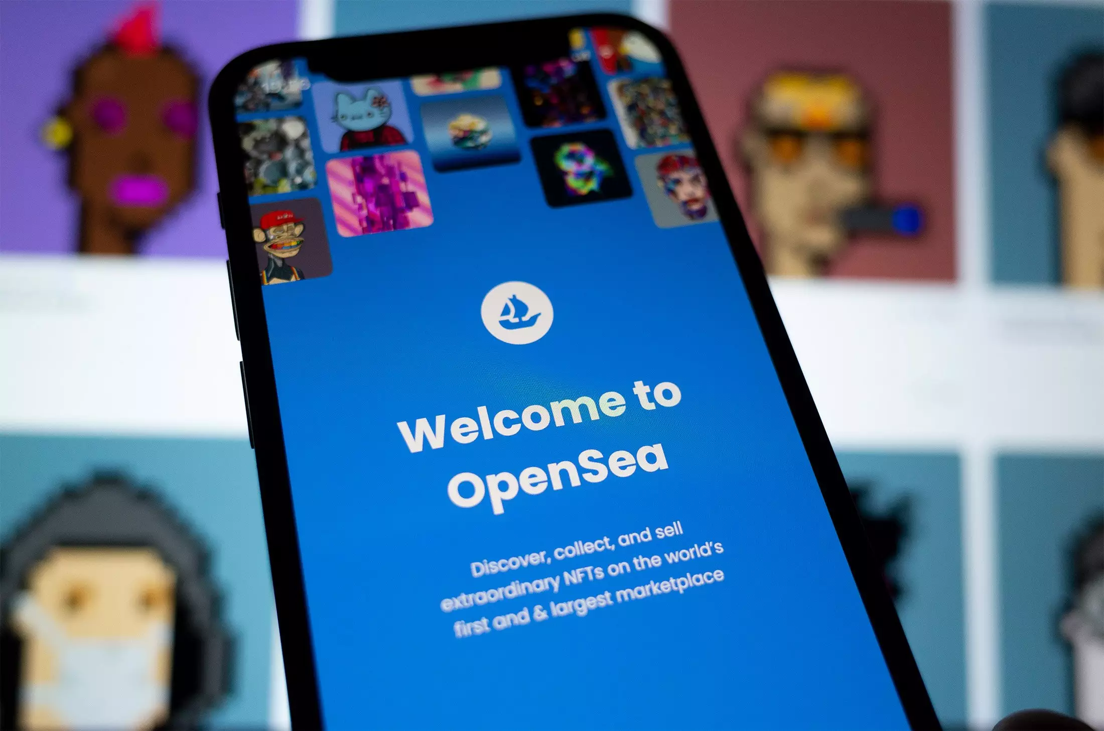 Image of OpenSea on a mobile phone workforce
