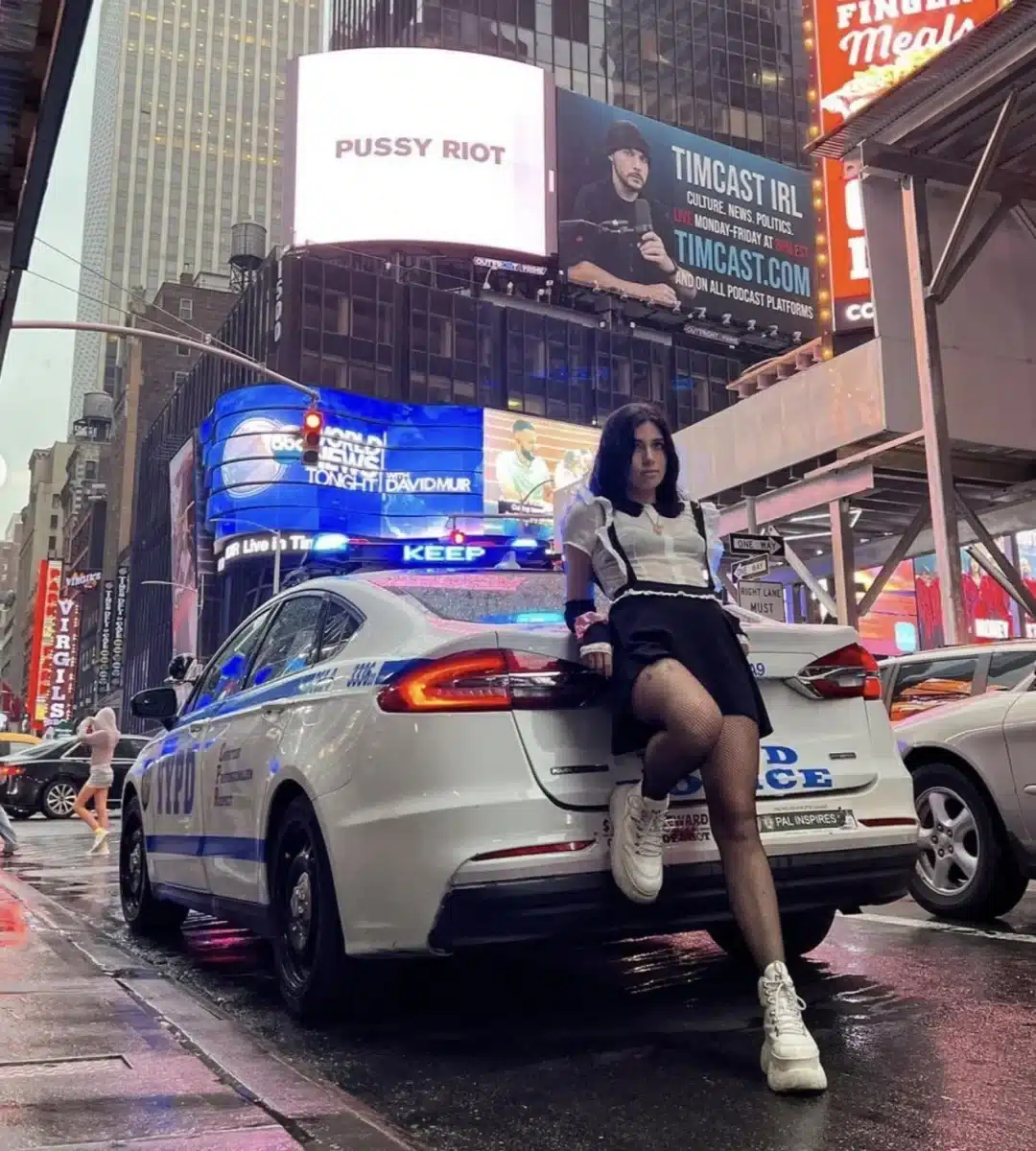 Pussy Riot’s Nadya Tolokonnikova sitting on a car