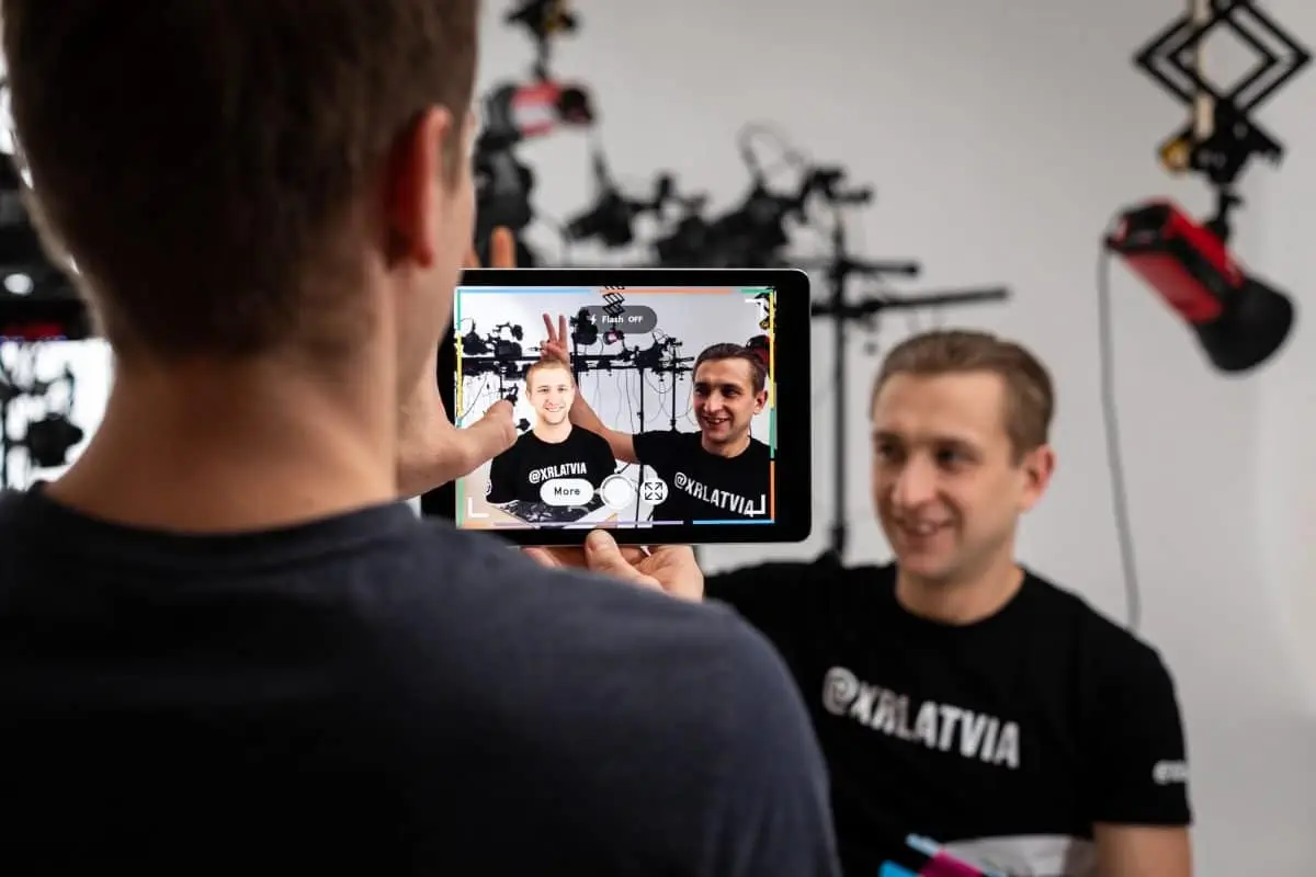 Overly's CEO Gatis Zvejnieks interacting with AR NFT
